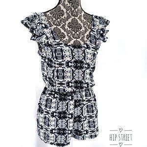 CHARLOTTE RUSSE Sleeveless Ruffle Shoulder Ikat Print Romper M